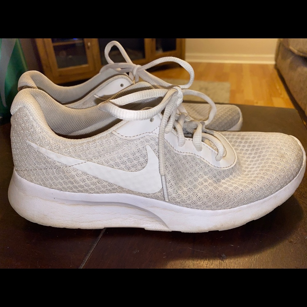 All white Nike shoes